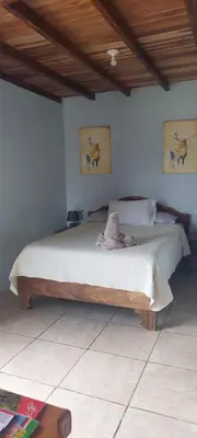 a bedroom with a large bed in a room at Apartamento Siary 1 in Monteverde Costa Rica