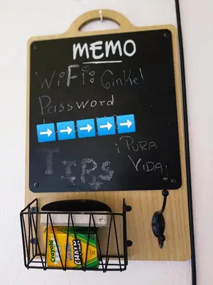 a sign that says memo with its grinder password at Departamentos Patricia in Alajuela City