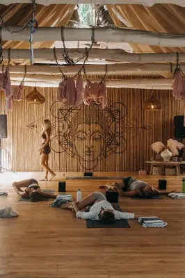a group of people laying on the floor in a room at Norte Nosara - Steps to Playa Guiones in Nosara