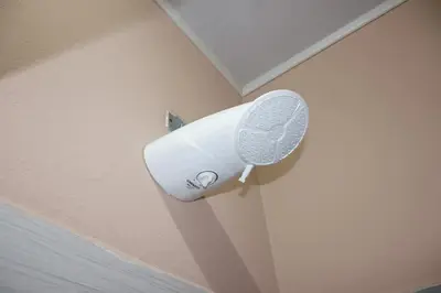 a white light on the corner of a wall at Hotel La Castella in San José