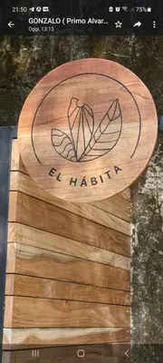 a wooden cutting board with a sign that reads be harry at El Hábita CASA MAR in Santa Teresa Beach