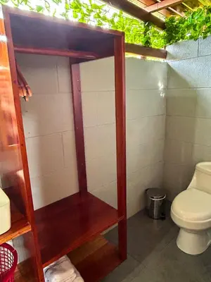 a small bathroom with a toilet in a room at Tiny Villa Experience in Fortuna