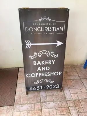 a sign for a bakery and coffee shop at Valle Dorado 9 in Coco