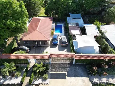 an aerial view of a house with a swimming pool at Ubuntu Glamping in Guanacaste