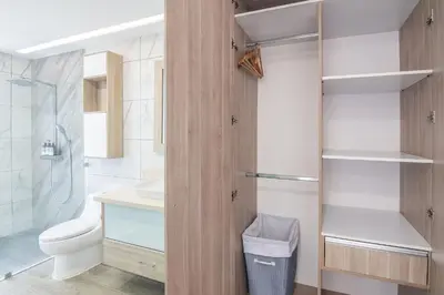 a bathroom with a toilet and a sink and a shower at Luxury Villa #11 El Oceano in Playa Hermosa