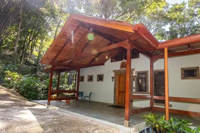 a pavilion on the side of a building at 4BR Villa MotMot in w exclusive pool Wifi Ac in Quepos