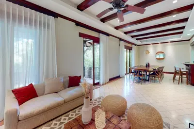 a living room with a couch and a table at Pinilla Flor de Malinche 15 in Tamarindo