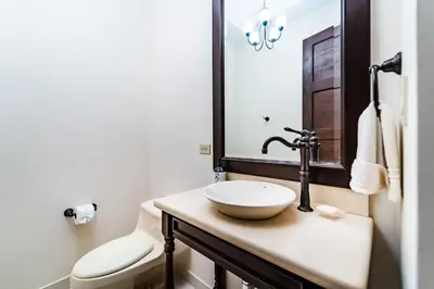 a bathroom with a sink and a toilet at Villa Estrella del Mar in Tamarindo
