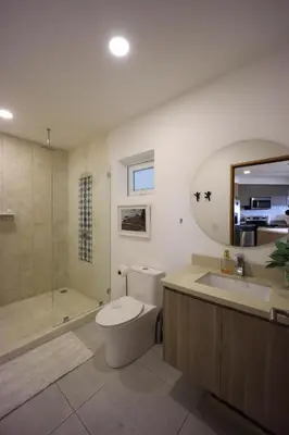 a bathroom with a toilet and a sink and a shower at Brandnew Luxury 2Bdr condo✰Stunning view✰Fast wifi in Tamarindo