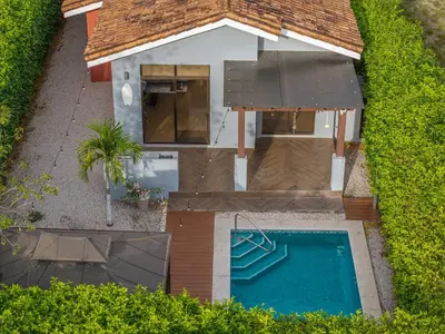 an overhead view of a house with a swimming pool at Playa Tamarindo, CasaMar de Tamarindo in Tamarindo