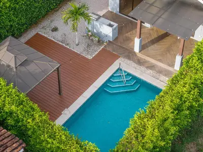an overhead view of a small boat in a pool at Playa Tamarindo, CasaMar de Tamarindo in Tamarindo