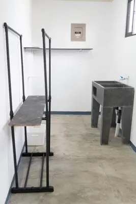 a room with a sink and a bench in a room at NAPPO Room 2 Alajuela, Heredia,SJO,5min from airport NO PARKING in Guácima