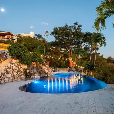 Stunning Mountaintop Property with Stylish Main Home