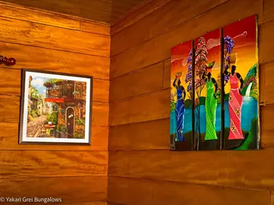 a painting hanging on a wall at Bungalows Yakari Grei in San Ramón