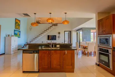 a kitchen with a sink and a counter top at Adults Only 4BR Penthouse w Partial Ocean View, Carao Reserva Conchal in Playa Conchal