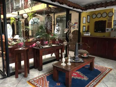 a room with two tables in a store at Hotel Amón Real Costa Rica in San José
