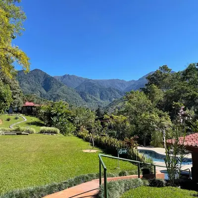 a resort with a view of the mountains at Hotel de Montaña El Pelicano in San Isidro