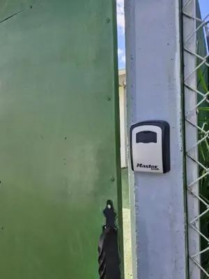 a door with a toaster on the side of a building at La casa del volcán in Fortuna