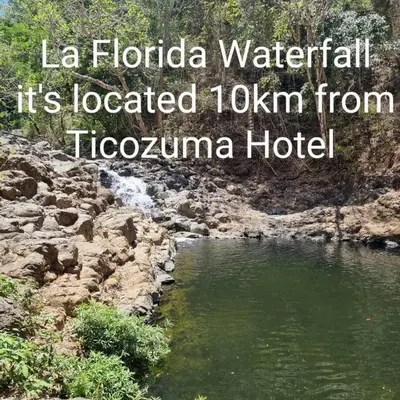 a river with the text la floria waterfalls its located from t at Hotel Ticozuma in Montezuma