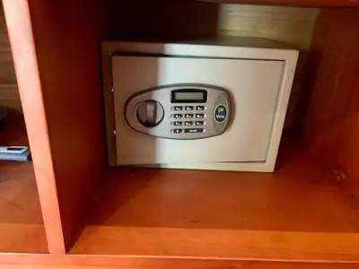 a microwave oven sitting inside of a cabinet at Ocean Melody 3 in Uvita
