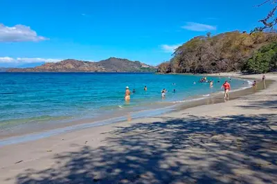 a group of people in the water at a beach at Villaggio Claudia 29B in Potrero