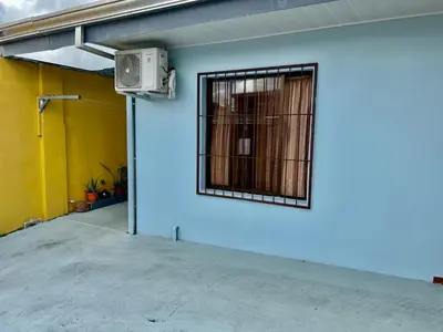 a room with a window with a fence on a wall at Apartamentos M&M in Fortuna