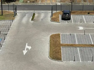 a car parked in a parking lot with arrows at Bejuco Beachfront Condo FRENTE A LA PLAYA hermoso condominio NUEVO in Esterillos Este