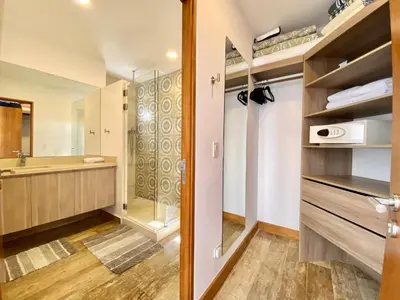 a bathroom with a shower and a sink at Tropical Luxury 2Bdr condo - Pool view - At the Beach in Tamarindo
