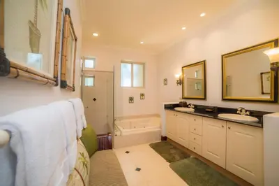 a bathroom with a sink and a bath tub at Bella Vista 2D 3 bdrs pool view in Los Suenos in Herradura