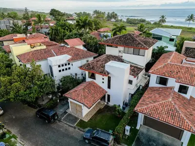 an aerial view of a residential neighborhood with houses at Casa Lapa Oceanside Villa in Playa Hermosa