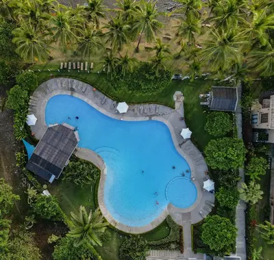 an overhead view of a swimming pool at a resort at Casa Lapa Penthouse Oceanside Villa in Playa Hermosa