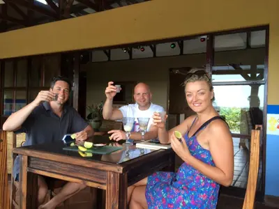 a group of people sitting at a table drinking wine at Unique 5 Architectural Homes, Pool & Wi-Fi in Lagunillas