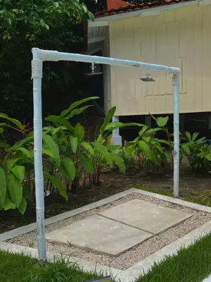 a gazebo in front of a house with at Grand Park Manuel Antonio - Adults Only in Manuel Antonio