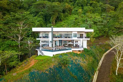 an aerial view of a house on a hill at Casa Amigos - By Pura Villas in Dominical