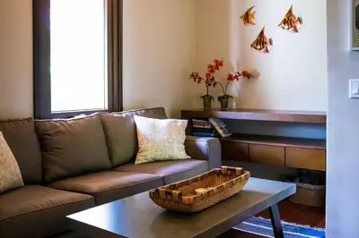 a living room with a couch and a coffee table at Luxury Home with Views and Infinity Pool Near Beach! in Puerto Viejo