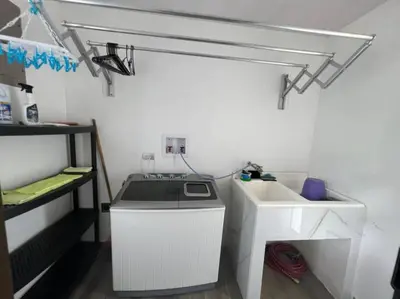 a kitchen with a sink and a stove at Encantadora Casa Amapolas in Cóbano