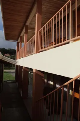 an external view of a building with a balcony at Hotel La Puesta Del Sol B&B in Monteverde Costa Rica