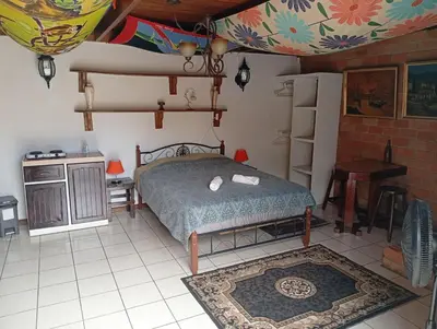 a bedroom with a bed in a room at Confortable y privado estudio en zona exclusiva . in San José