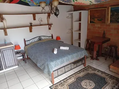 a bedroom with a bed in a room at Confortable y privado estudio en zona exclusiva . in San José