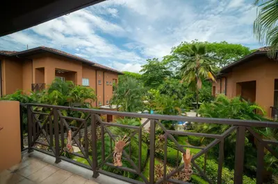 a view from the balcony of a resort at Veranda 3B 2 bdr Garden View in Los Suenos in Herradura