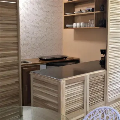 a kitchen with a counter top in a room at Space One in Manuel Antonio