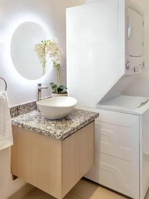 a bathroom with a bowl sink on a counter at Modern 2BR Condo - minutes from Jaco Beach - PRIME location in Jacó