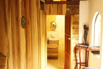 a bathroom with a sink and a toilet in it at Casa Alquimia in Monteverde Costa Rica