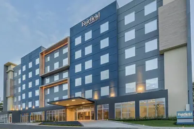 a hotel building with a sign that reads brabus at Fairfield by Marriott San Jose Airport Alajuela in Alajuela City