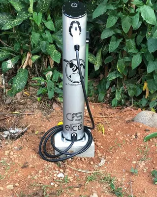 a gas cylinder sitting on the ground in the dirt at La Cusinga Lodge in Uvita