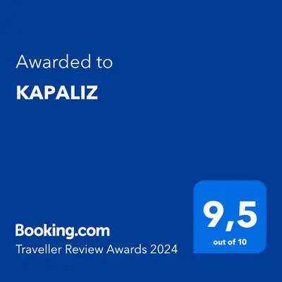 a blue phone screen with the text awarded to kaplyak at KAPALIZ in Tigre