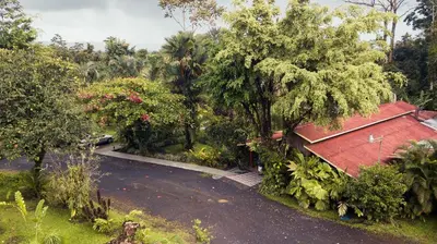 an overhead view of a road with a red roof at Catarata Eco Lodge in Fortuna