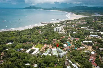an aerial view of a city and the beach at Villa Verde II #30 in Tamarindo