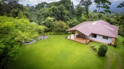 an overhead view of a house in a field of grass at Bromelia House in San Gerardo
