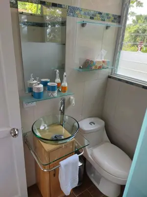 a bathroom with a sink and a toilet at Bungalows Sanlaz in Barrio Jesús
